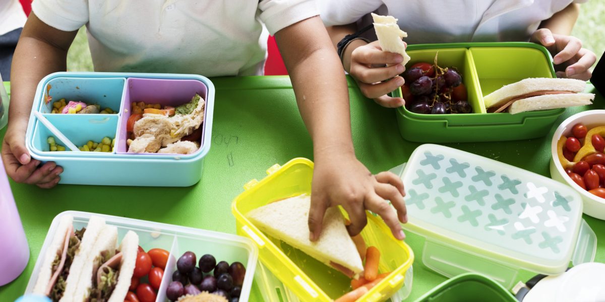 Kids eating lunch at elementary school